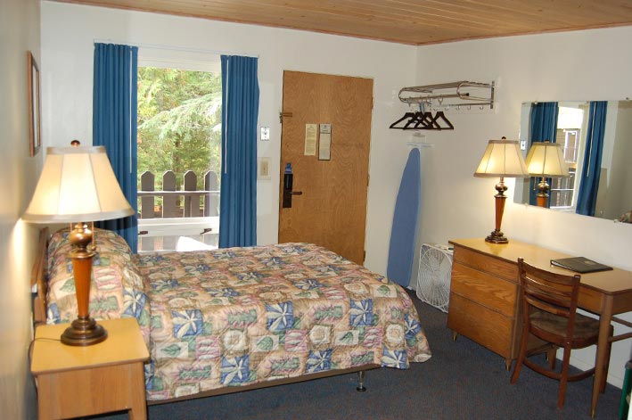 Motel Room at Motel Lake McDonald with one double bed and small desk