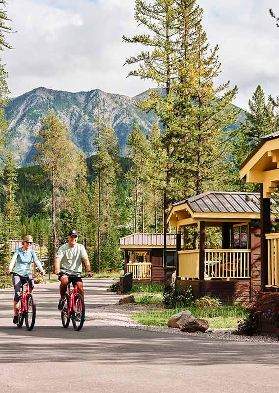 couple cycles through the West Glacier Cabins