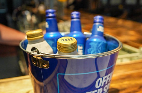 A couple watching the football game on a restaurant patio